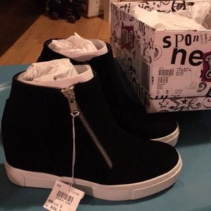 Women’s high heeled sneaker.